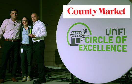Grove City County Market holding their award